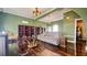 Spacious living room with hardwood floors, built in shelving and room to entertain at 679 Victorian Cir, Dallas, GA 30157