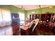 Inviting living room featuring hardwood floors, a comfortable couch, and ample shelving at 679 Victorian Cir, Dallas, GA 30157
