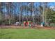 Large backyard with an outdoor play area for , enclosed by a fence at 820 Thermopylae Ct, Alpharetta, GA 30005