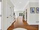 Inviting foyer featuring hardwood floors, fresh paint, and ample natural light at 820 Thermopylae Ct, Alpharetta, GA 30005