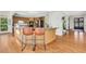 Kitchen boasts a large island, stainless appliances, and hardwood floors for a warm, inviting space at 820 Thermopylae Ct, Alpharetta, GA 30005