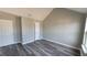 Bedroom features neutral paint, a vaulted ceiling and luxury vinyl plank flooring at 4271 Winston Cir, South Fulton, GA 30349