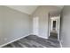 Bedroom features luxury vinyl plank flooring, neutral paint and a vaulted ceiling at 4271 Winston Cir, South Fulton, GA 30349