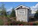Welcome to Alcovy Trace by Century Communities: Stone monument sign surrounded by landscaping at 650 Cayenne Way, Lawrenceville, GA 30045