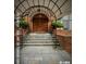 Elegant entrance with brick facade and arched awning at 6851 Roswell Rd # N10, Sandy Springs, GA 30328