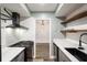 Bright kitchen showcasing stainless steel appliances, white subway tile, and gray cabinets at 6851 Roswell Rd # N10, Sandy Springs, GA 30328