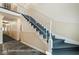 Stairway with carpeted steps and white metal railing, leading to upper levels of the building at 6851 Roswell Rd # N10, Sandy Springs, GA 30328