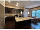 Modern kitchen with stainless steel appliances, granite countertops and island with sink at 745 Fountainhead Ne Ln # 130, Atlanta, GA 30324