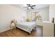 Bedroom with hardwood floors, ceiling fan, natural light and a cozy feel at 2300 Hopehaven Way, Hoschton, GA 30548