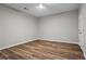 Empty bedroom featuring hardwood floors, a ceiling fan, and a closet at 2782 Loftview Sq, Atlanta, GA 30339