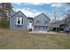 Charming two-story home with a bay window, a covered carport, and a well-manicured front yard at 41 Silverthorne Ct, Douglasville, GA 30134