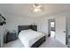 Main bedroom featuring carpet floors, modern furniture and decor at 41 Silverthorne Ct, Douglasville, GA 30134