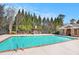 Outdoor community pool with pergola and mature trees at 849 Perennial Dr, Atlanta, GA 30328