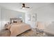 Cozy bedroom with neutral tones, a comfortable bed, and a ceiling fan at 367 Reserve Overlook, Canton, GA 30115