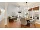 Open-concept living room with a dining area and high ceilings at 3966 Creekview Ridge Dr, Buford, GA 30518