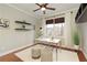 Bright home office with floating shelves and a large window at 3966 Creekview Ridge Dr, Buford, GA 30518