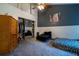 Bedroom featuring gray walls, carpet, and a mirrored closet at 703 Cypress Pointe St, Alpharetta, GA 30022