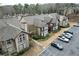 Exterior view of this condo community featuring parking at 703 Cypress Pointe St, Alpharetta, GA 30022
