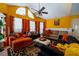 Cozy living room with lots of seating, large windows, and an open layout at 703 Cypress Pointe St, Alpharetta, GA 30022