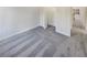 Neutral bedroom with closet and window featuring plush gray carpet and newly painted white walls at 1200 Platinum Dr, Hoschton, GA 30548