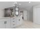 Bathroom features floating vanity, modern fixtures, and an access door to an adjacent room at 1521 Bentcreek Dr, Marietta, GA 30062