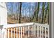 Inviting deck offers peaceful views of the surrounding wooded landscape at 1521 Bentcreek Dr, Marietta, GA 30062