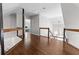 Spacious loft featuring hardwood floors and a modern cable railing at 1521 Bentcreek Dr, Marietta, GA 30062