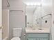 This bathroom includes a bathtub, toilet, vanity with mirror, and towel rack at 2390 Morgan Ne Rd, Marietta, GA 30066