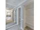 Hallway featuring an open closet and full wall mirror at 2390 Morgan Ne Rd, Marietta, GA 30066