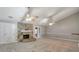 Spacious living room with a stone fireplace and access to the patio at 2390 Morgan Ne Rd, Marietta, GA 30066
