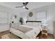 Inviting bedroom with a ceiling fan, two windows, and soft textures for a cozy retreat at 3096 Highland Se Dr, Smyrna, GA 30080