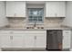 Kitchen with white cabinets, stainless steel appliances, granite countertops and new wood floors at 555 N Lake N Dr, Covington, GA 30016