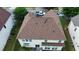 Aerial view of the home showcasing a brown roof, backyard and surrounding greenery at 5625 Jamerson Dr, South Fulton, GA 30349