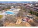 Community aerial view showcasing pool, playground, and park, providing diverse recreational options for residents at 916 Ira Sw St, Atlanta, GA 30310