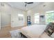 Bright bedroom with vaulted ceiling and recessed lighting, featuring several windows for ample natural light at 916 Ira Sw St, Atlanta, GA 30310