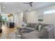 Cozy living room with an open layout, hardwood floors, and comfortable gray sectional at 916 Ira Sw St, Atlanta, GA 30310