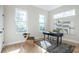 Bright and airy home office with hardwood floors, two windows, and modern decor at 916 Ira Sw St, Atlanta, GA 30310