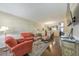 Bright living room featuring hardwood floors, cozy seating, and an open concept design at 2415 Clock Face Ct, Lawrenceville, GA 30043