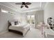 Inviting bedroom with natural light showcases a decorative hanging chair for relaxation, and a stylish vanity at 3180 Wills Mill Rd, Cumming, GA 30041