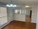 Dining room area with wood flooring and view of kitchen at 503 N Shore Rd, Lithonia, GA 30058