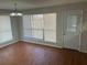 Dining area with modern chandelier and natural light streaming through large windows at 503 N Shore Rd, Lithonia, GA 30058