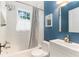 Charming bathroom with a tiled shower, soaking tub, and white vanity at 648 Cooledge Ave, Atlanta, GA 30306