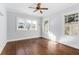 Bright bedroom with hardwood floors, multiple windows, and neutral paint at 648 Cooledge Ave, Atlanta, GA 30306