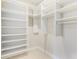 Well-organized walk-in closet with custom shelving and ample storage space at 648 Cooledge Ave, Atlanta, GA 30306