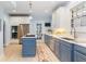 Modern kitchen with stainless steel appliances, custom cabinetry, and bright countertops at 648 Cooledge Ave, Atlanta, GA 30306