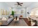 Bright living room with hardwood floors, a large window, and stylish decor at 648 Cooledge Ave, Atlanta, GA 30306