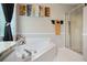 Corner view of bathroom with garden tub and glass enclosed shower at 76 Barrington Farms Pkwy, Sharpsburg, GA 30277