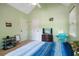 Bright bedroom with neutral walls and a ceiling fan at 76 Barrington Farms Pkwy, Sharpsburg, GA 30277