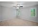 Bedroom with neutral carpeting, neutral walls, and natural light at 76 Barrington Farms Pkwy, Sharpsburg, GA 30277