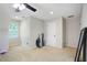 Large bonus room with pitched ceiling and neutral carpeting at 76 Barrington Farms Pkwy, Sharpsburg, GA 30277